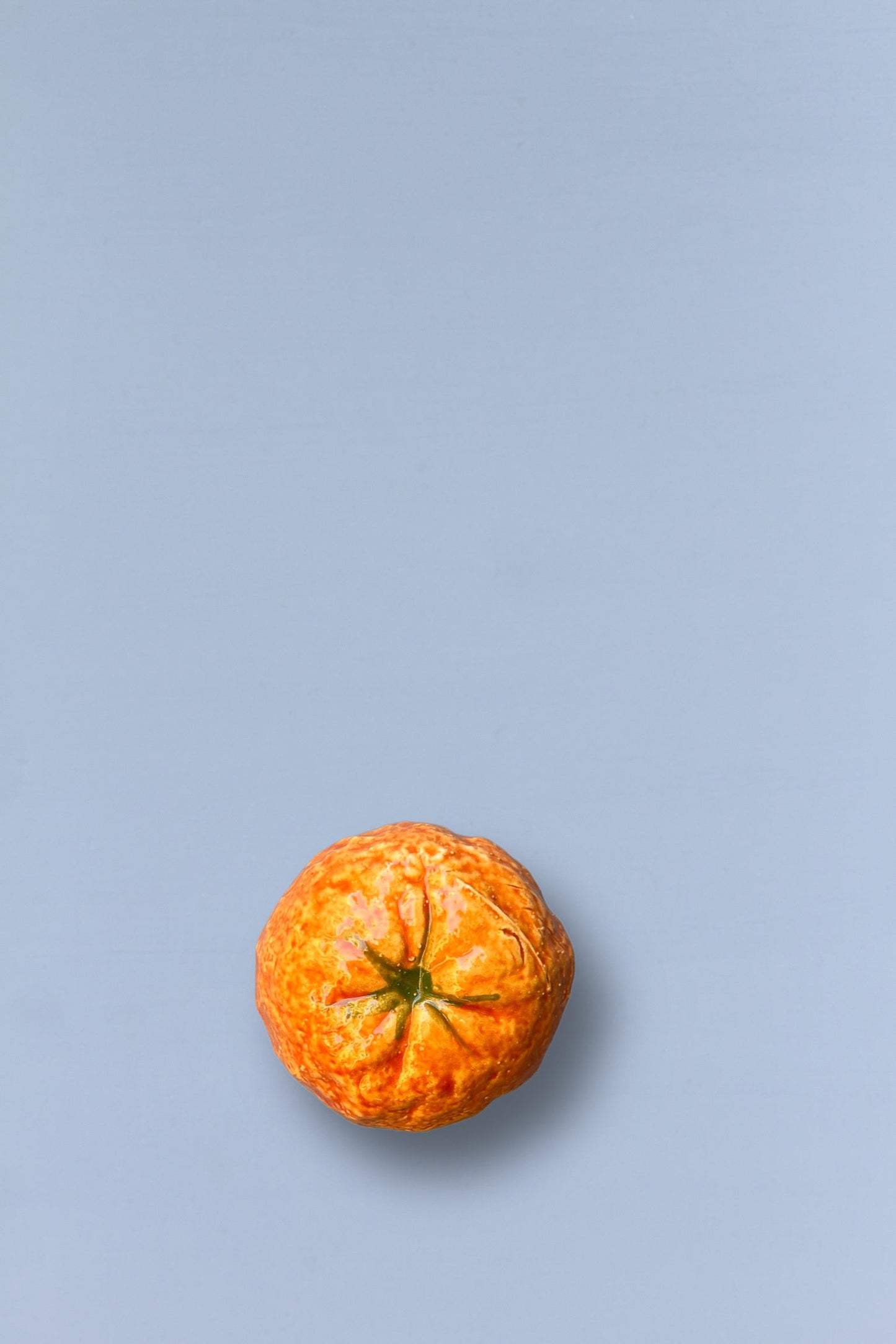 Mandarina réplica de cerámica esmaltada