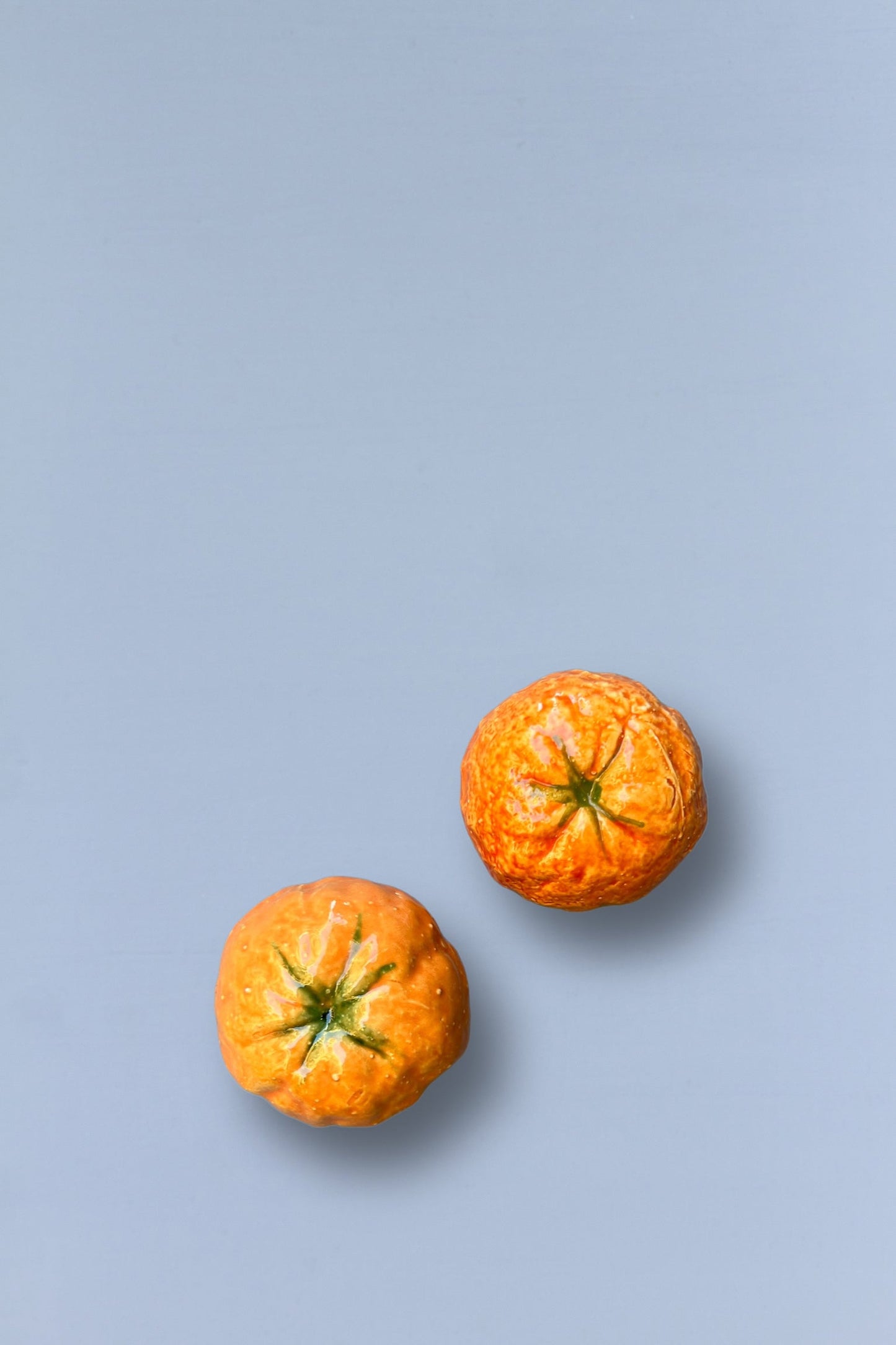 Mandarina réplica de cerámica esmaltada
