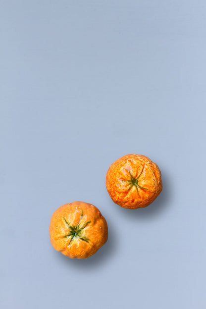 Mandarina réplica de cerámica esmaltada