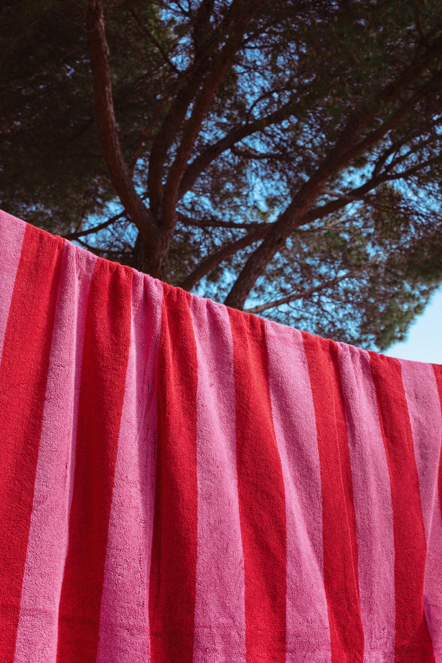 Toalla playa reversible verde y rosa
